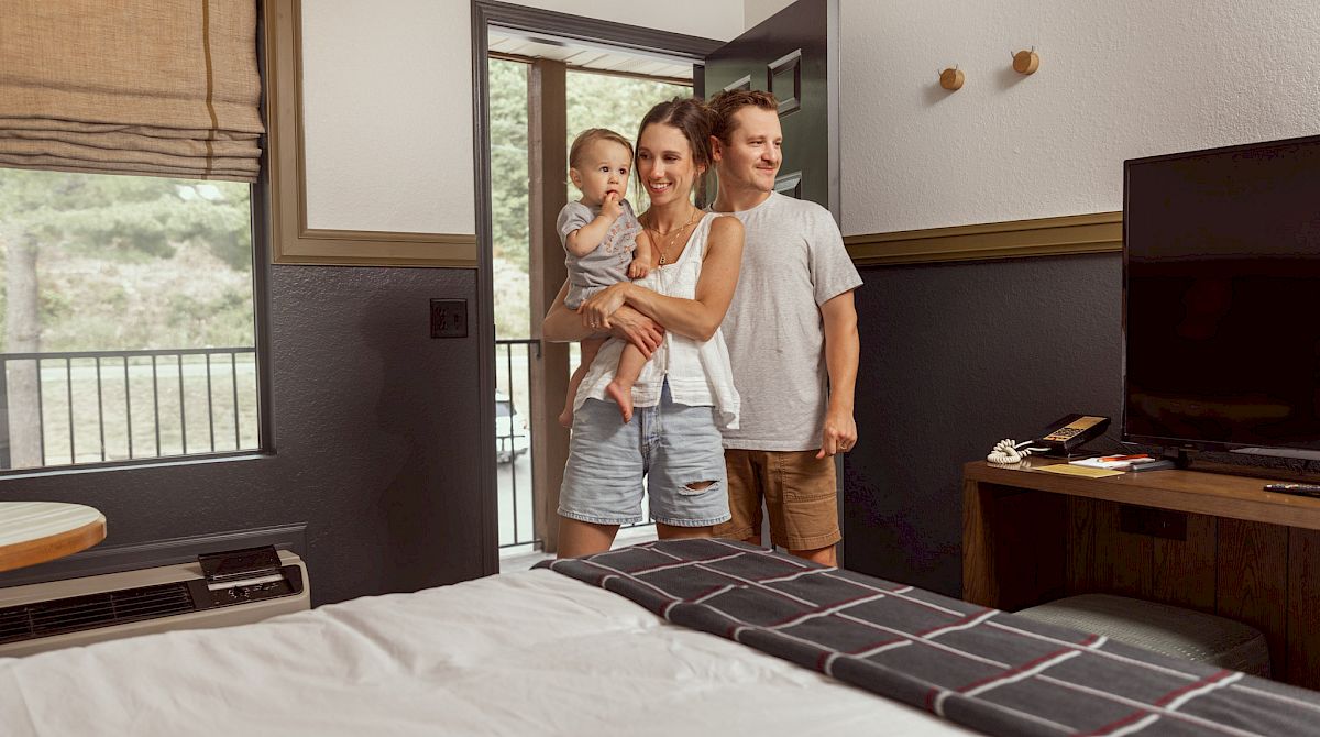 Young family in bedroom